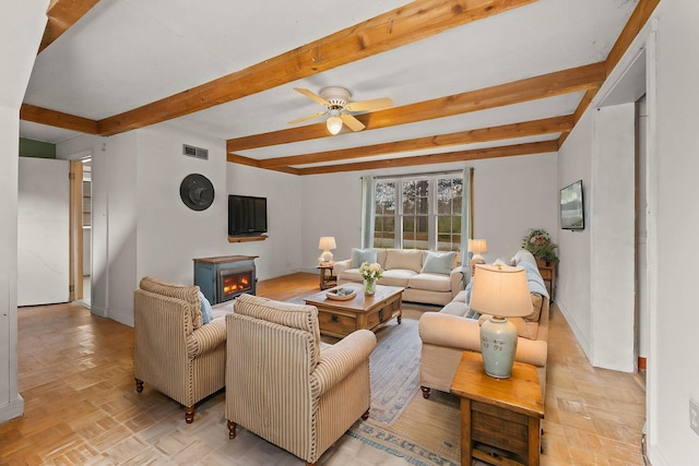 20 Crystal Spring Ln, Rome, ME 04963 - living area with baseboards, beamed ceiling, and a ceiling fan