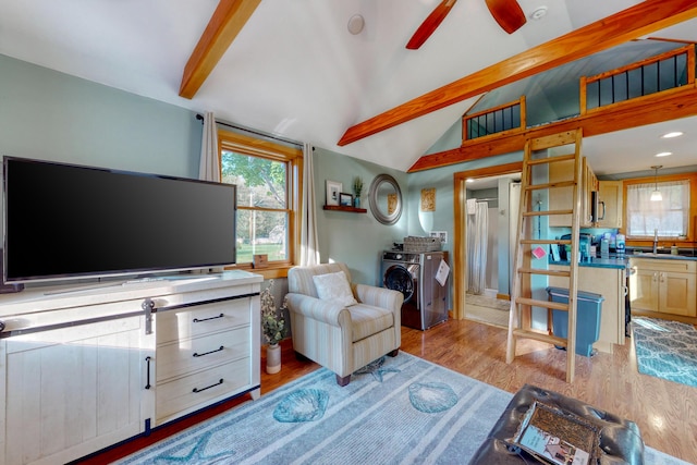 24 Ross Rd, Kennebunk, ME 04043 - living room featuring washer and dryer, light wood finished floors, and a ceiling fan