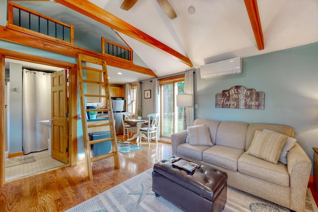 24 Ross Rd, Kennebunk, ME 04043 - living area featuring an AC wall unit and light wood-style flooring
