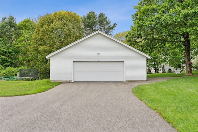 24 Ross Rd, Kennebunk, ME 04043 - detached garage featuring a trampoline
