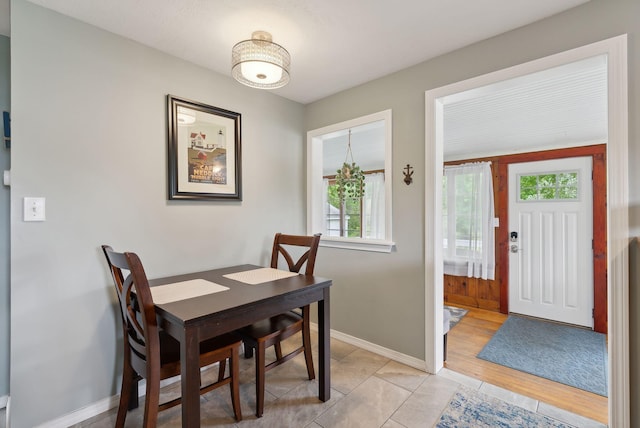 24 Ross Rd, Kennebunk, ME 04043 - dining space with plenty of natural light and baseboards