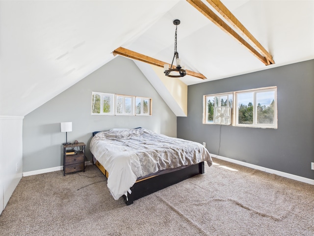 60 Carson Rd, Perham, ME 04766 - carpeted bedroom with multiple windows, baseboards, lofted ceiling with beams, and ceiling fan