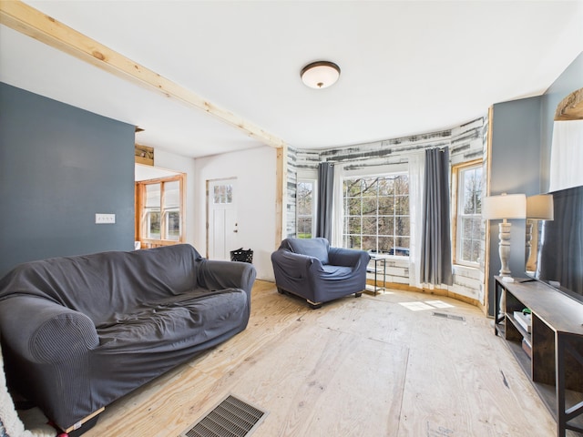 60 Carson Rd, Perham, ME 04766 - living area with visible vents and wood finished floors