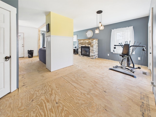 60 Carson Rd, Perham, ME 04766 - exercise area featuring a stone fireplace and visible vents