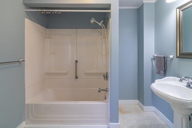 753 Sebec Village Rd, Sebec, ME 04481 - bathroom with baseboards, shower / bathtub combination, and a sink