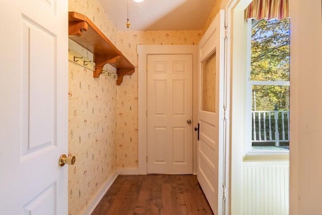 753 Sebec Village Rd, Sebec, ME 04481 - mudroom featuring wallpapered walls, wood finished floors, and baseboards
