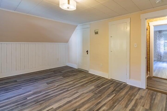 753 Sebec Village Rd, Sebec, ME 04481 - additional living space with wood finished floors, baseboards, and lofted ceiling