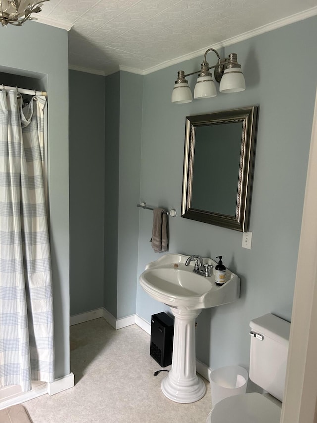 753 Sebec Village Rd, Sebec, ME 04481 - full bathroom with toilet, curtained shower, crown molding, and baseboards