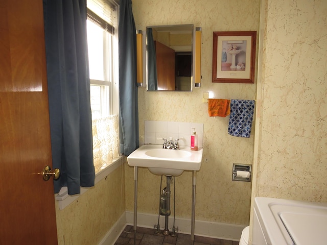 bathroom with baseboards