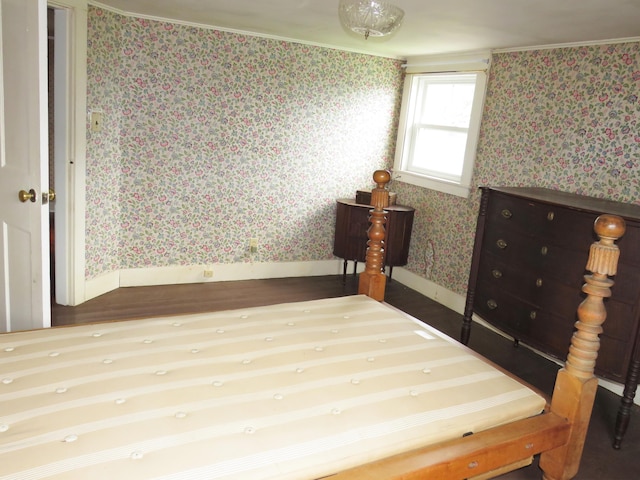 bedroom with wallpapered walls