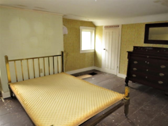 bedroom featuring baseboards