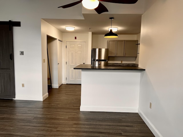 1 Saco Island Ter Unit 205, Saco, ME 04072 - kitchen with freestanding refrigerator, ceiling fan, dark countertops, dark wood-type flooring, and a peninsula