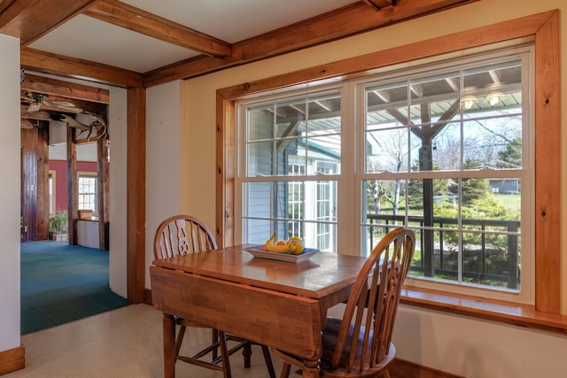 dining room featuring beam ceiling