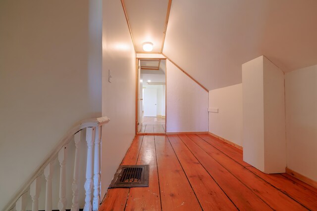 370 Christian Ridge Rd, Ellsworth, ME 04605 - additional living space featuring vaulted ceiling, visible vents, and light wood-style floors