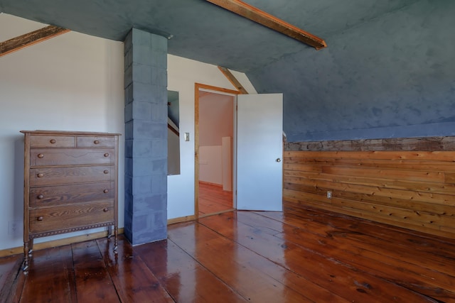 bonus room featuring lofted ceiling and hardwood / wood-style flooring