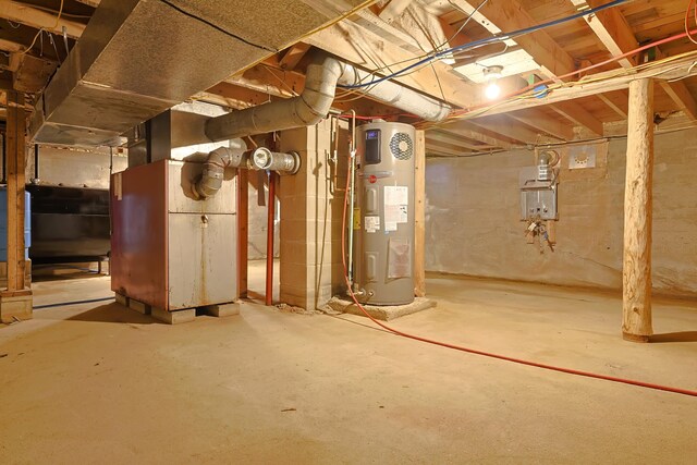 370 Christian Ridge Rd, Ellsworth, ME 04605 - unfinished basement with heat pump water heater and heating unit