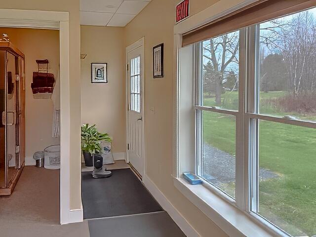370 Christian Ridge Rd, Ellsworth, ME 04605 - doorway to outside with baseboards