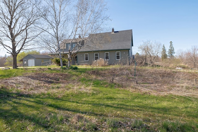 view of front of property featuring a chimney