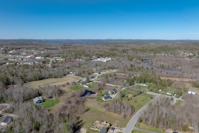 bird's eye view featuring a forest view