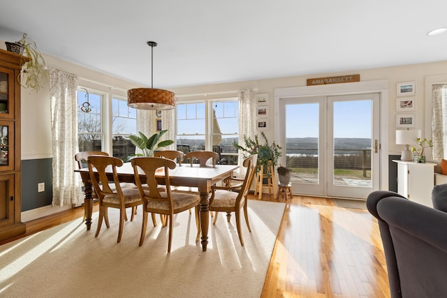 83 Barrett Hill Rd, Hope, ME 04847 - dining space with light wood-style flooring and recessed lighting