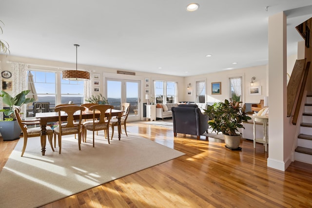 83 Barrett Hill Rd, Hope, ME 04847 - dining area featuring stairway, light wood-style flooring, and recessed lighting