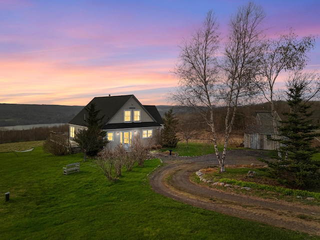 83 Barrett Hill Rd, Hope, ME 04847 - view of front of house with a lawn, driveway, and an outbuilding