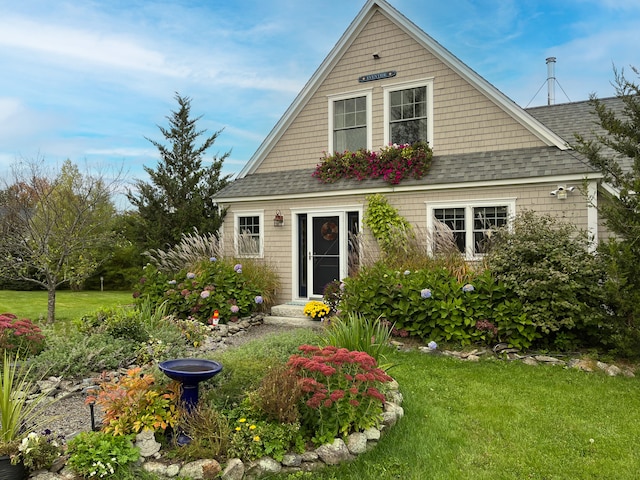 83 Barrett Hill Rd, Hope, ME 04847 - back of house with a shingled roof, a lawn, and entry steps
