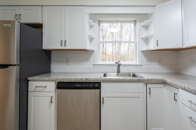 3 Great Pond Ter Unit 3, Cape Elizabeth, ME 04107 - kitchen featuring open shelves, white cabinetry, stainless steel appliances, and a sink