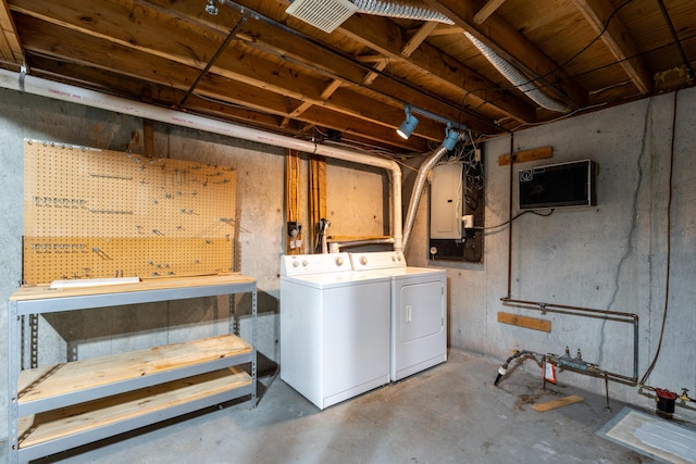 3 Great Pond Ter Unit 3, Cape Elizabeth, ME 04107 - unfinished below grade area with electric panel, a workshop area, and washer and dryer