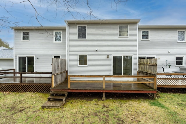 3 Great Pond Ter Unit 3, Cape Elizabeth, ME 04107 - rear view of house with a wooden deck and a lawn