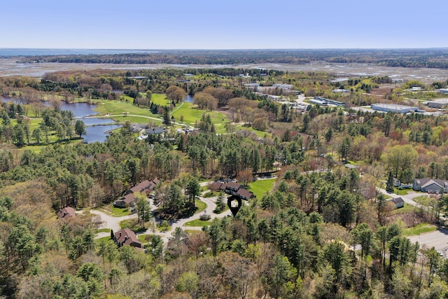 aerial view of property's location with a nearby body of water