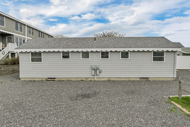 273 Webhannet Dr Unit 8, Wells, ME 04090 - back of property featuring roof with shingles