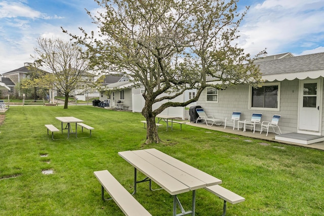 273 Webhannet Dr Unit 8, Wells, ME 04090 - surrounding community with a lawn
