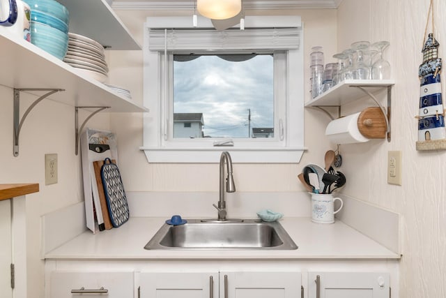 273 Webhannet Dr Unit 8, Wells, ME 04090 - kitchen featuring a sink, white cabinetry, light countertops, and open shelves