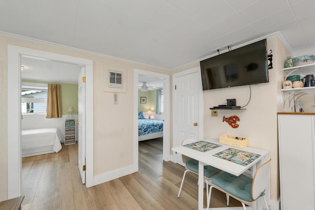 273 Webhannet Dr Unit 8, Wells, ME 04090 - kitchen with light wood-type flooring, ornamental molding, and baseboards