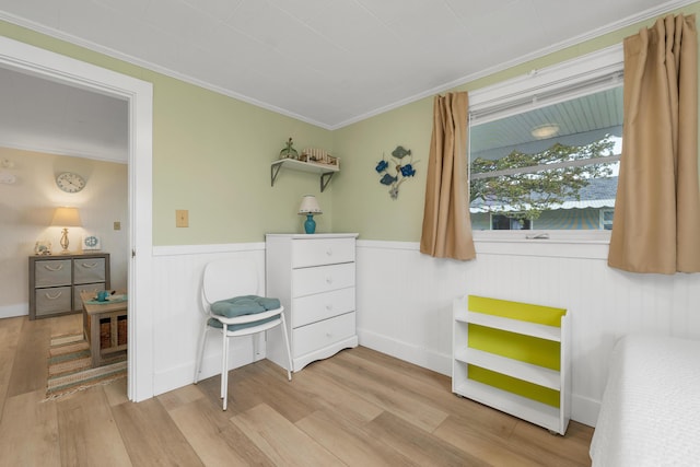 273 Webhannet Dr Unit 8, Wells, ME 04090 - bedroom with light wood-style flooring, crown molding, and wainscoting