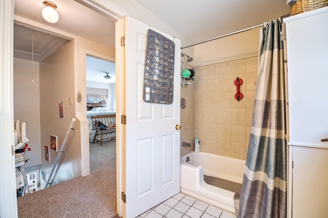 full bath featuring shower / tub combo and tile patterned flooring