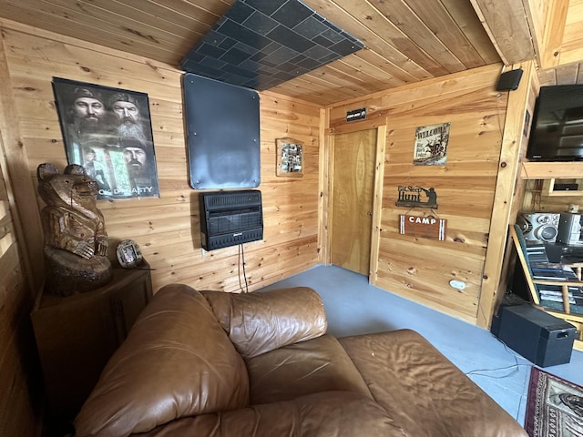 42 Cyrs Siding Rd, Saint Albans, ME 04971 - living area featuring wood walls, heating unit, and wood ceiling
