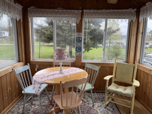 76 Post Rd Unit C9, Wells, ME 04090 - sunroom / solarium featuring wood walls and plenty of natural light