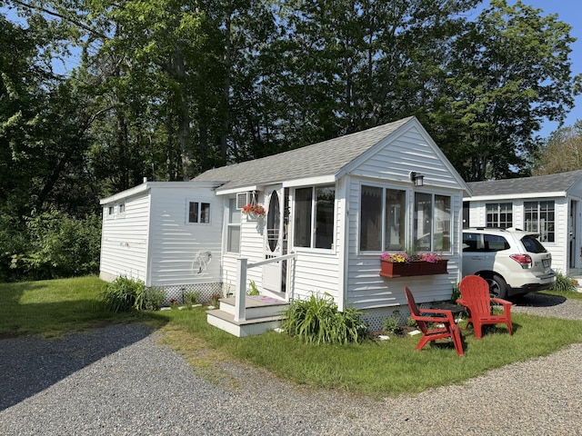 76 Post Rd Unit C9, Wells, ME 04090 - view of front of home featuring a shingled roof