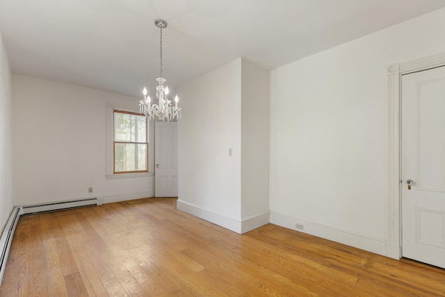 44 Pascal Ave, Rockport, ME 04856 - unfurnished room featuring a chandelier, light wood-style floors, baseboards, and a baseboard heating unit