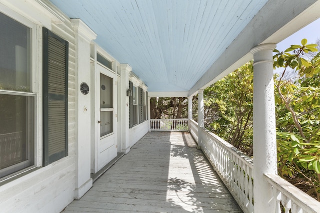 44 Pascal Ave, Rockport, ME 04856 - wooden deck featuring covered porch