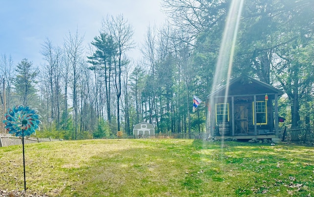 1363 Hallowell Rd, Litchfield, ME 04350 - view of yard featuring a storage unit and an outdoor structure
