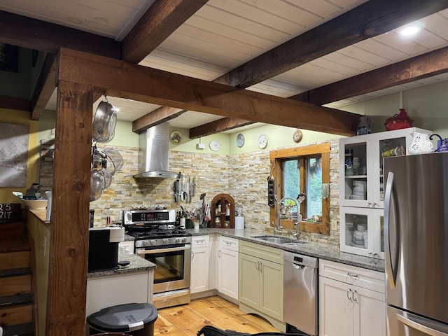 1363 Hallowell Rd, Litchfield, ME 04350 - kitchen with appliances with stainless steel finishes, a sink, wall chimney range hood, tasteful backsplash, and stone countertops