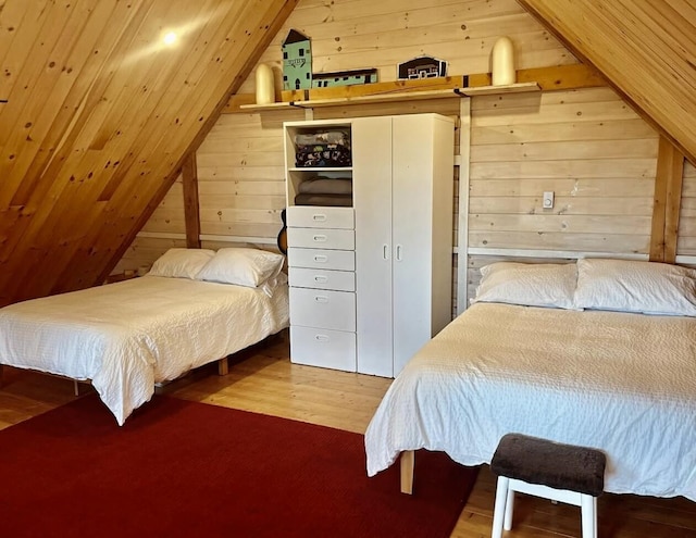 26 Hamilton Dr, Vinalhaven, ME 04863 - bedroom featuring wood walls, lofted ceiling, and wood finished floors