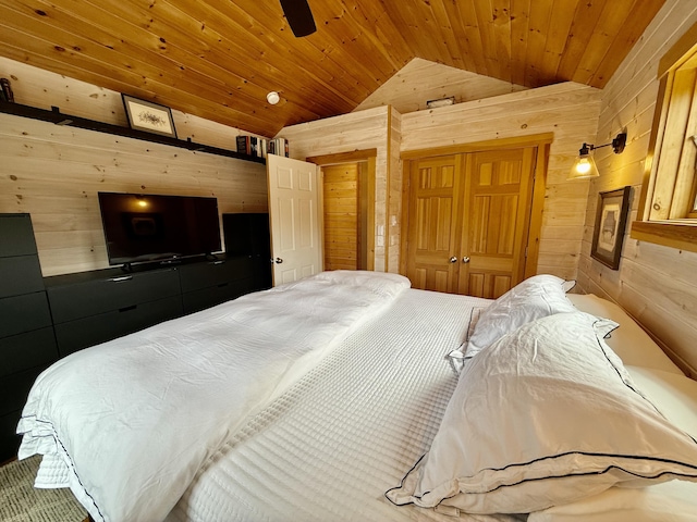 26 Hamilton Dr, Vinalhaven, ME 04863 - bedroom with wood walls, vaulted ceiling, wooden ceiling, and a closet