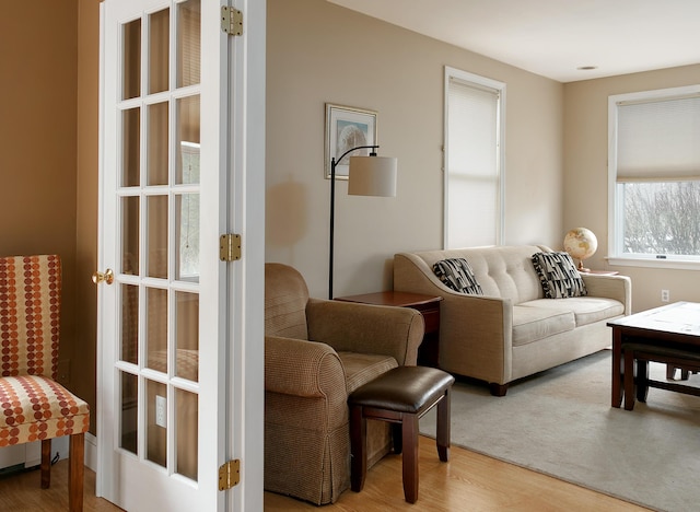 63 Fletcher St, Kennebunk, ME 04043 - sitting room featuring wood finished floors and french doors