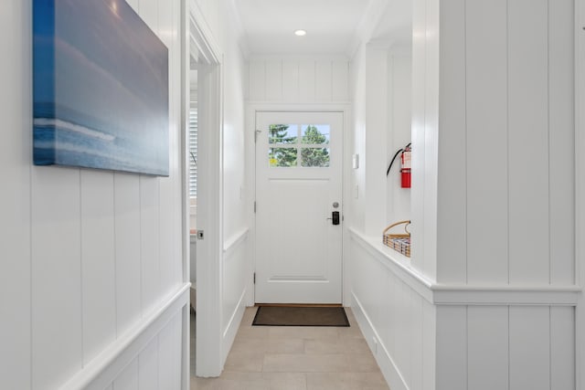 1 Harris Ln, Kennebunk, ME 04043 - doorway with a decorative wall and light tile patterned flooring
