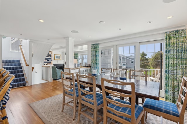 1 Harris Ln, Kennebunk, ME 04043 - dining area with a wealth of natural light, stairway, wood finished floors, and ornate columns