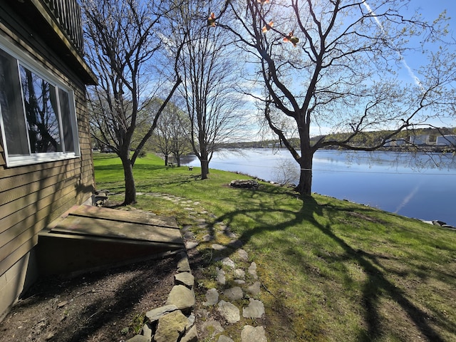 view of yard with a water view